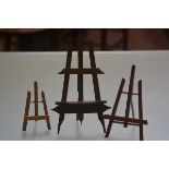 A group of three treen easels including a Bavarian style example. (3)