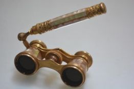 Opera interest: a pair of Chevalier of Paris ormolu and mother of pearl opera glasses (a/f)