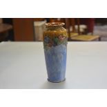 A Royal Doulton Lambeth Pottery tapered cylinder vase with peony and leaf tublined border with brown