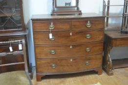 A 19th century mahogany bowfront chest, with crossbanded top over two short and three long