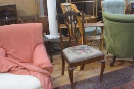 A 19th century mahogany pierced and carved splat back side chair on carved supports and pad feet.