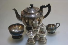 An EPNS three piece teaset and an EPNS condiment set