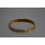 A 22ct gold wedding band. Total 1.9 grams