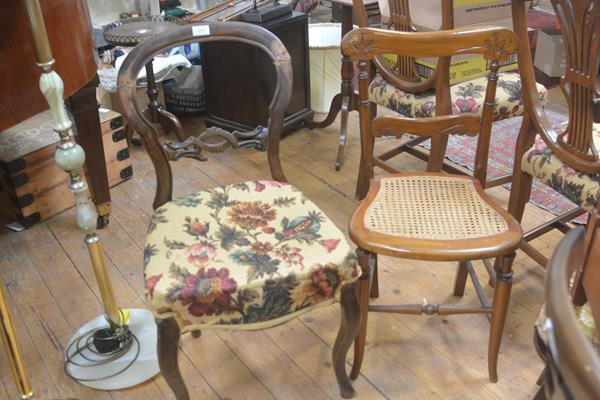 A Victorian walnut arched back side chair with stuffover seat, raised on carved moulded supports and