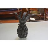 A treen segmented pineapple with dark stain finish (h.33cm x 12cm)