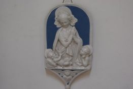 A Cantagalli Plaque in the style of Della Robbia depicting the Virgin and Child with cockerel verso