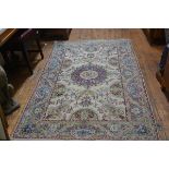 A Turkoman rug, the centre medallion with radiating lotus leaf and flower design enclosed within a