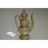 A late 19thc Chinese brass wine ewer of gourd form with dragon scroll handle to side, with allover