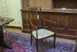 An Edwardian mahogany inlaid open spar back armchair with inset seat, raised on square tapered