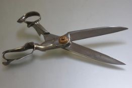 A large pair of polished steel draper's style scissors, Compton, New Jersey (34cm)