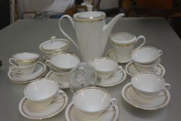 A Polish 1970s/80s vintage twenty three piece tea/coffee service with white body and gilt borders,