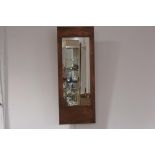 A modern embossed copper Art Nouveau style wall mirror, rectangular. 81cm by 30.5cm