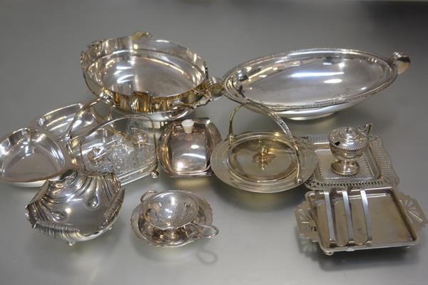 An Epns tea strainer, a collection of plated butter dishes, an Epns condiment set, an hors d'oeuvres