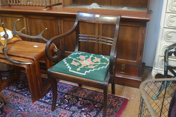 A Regency mahogany framed carver chair with curved top rail and ball pattern spar back, with slip in