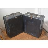 A pair of vintage blue fibreboard travelling cases, with leather handles and stencilled initials.