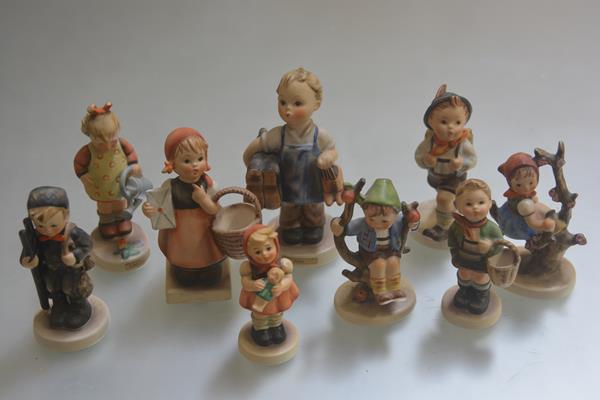 A collection of nine various Hummel pottery figures including Chimney Sweep Boy, the Little
