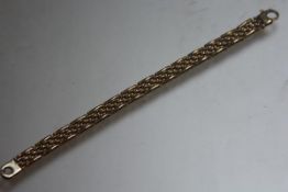 A 9ct gold gatelink bracelet (l. 19cm) (18.6g)