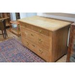 An Edwardian oak chest, the rectangular top (a/f) over 2 short and 2 long drawers, on square