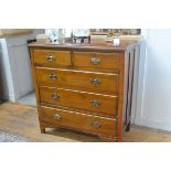 An Edwardian stained beech chest, with two short and three long drawers, on bracket feet. 102cm by