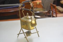 A 19thc brass embossed ebony mounted tea kettle, burner and stand (h.40cm x 20cm)