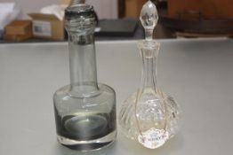 A modern 20thc Caithness smoked glass decanter complete with stopper (h.26cm), an Edwardian