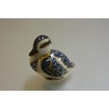 A Royal Crown Derby miniature china paperweight with blue and gilt decoration (h.7cm)