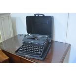 A Royal Quiet Deluxe portable typewriter with original case
