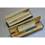 A pre 1975 Parker 61 Consort Insignia boxed fountain pen, a turquoise Parker 61 in clam shell box