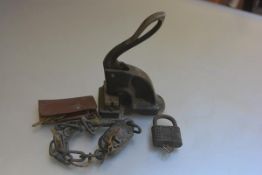 A desk embosser/punch and two various padlocks with keys (3)