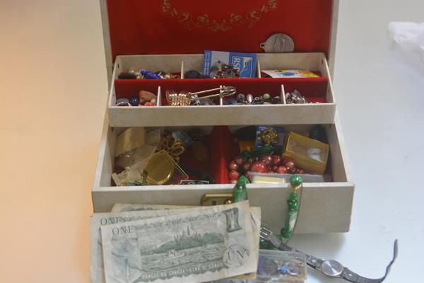 A jewellery box containing three Canadian one dollar notes, miscellaneous costume jewellery