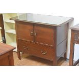 An Edwardian mahogany washstand, the rectangular top with plate glass over two inset panelled