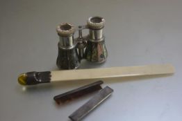 A 1920s engine turned pocket comb (l.10cm), a pair of abalone shell aluminum mounted opera glasses