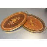 A pair of Sorrento ware inlaid oval brass gallery and twin handled trays (each: h.3cm x 47cm x