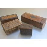 Two Bavarian style carved treen boxes, one with fitted interior, a pokerwork rectangular card box,