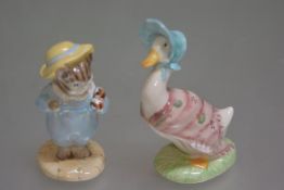 A Royal Albert Beatrix Potter china figure, Tom Kitten and Butterfly, and a Royal Doulton Beatrix