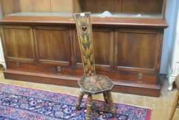 An Edwardian pokerwork fern decorated pierced heart shaped panel back and seat chair, raised on ring