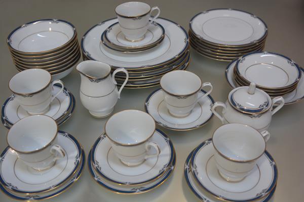 A Noritake Impressions thirty nine piece tea and dinner service including six teacups, saucers, side