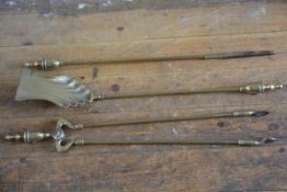 A set of three 19thc cast brass style fireirons with urn finials (poker: 67cm)