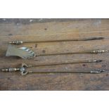 A set of three 19thc cast brass style fireirons with urn finials (poker: 67cm)