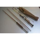 A glass fibre three part spinning rod and a split cane style three piece glass fibre spinning rod by