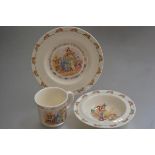 A Royal Doulton Bunnykins three piece child's Christening set including mug, bowl and plate, with