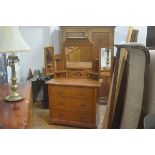 A Victorian ash dressing chest with rectangular mirror, with twin open shelves and adjustable side