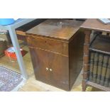 A 19thc mahogany cabinet, the square top with boxwood strung border, above a dummy drawer and double