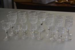 A set of seven crystal port glasses, a set of six sherry glasses, a set of six sherry glasses and