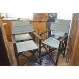 A set of four stained beech 1920s director's style chairs with green canvas back and seats, raised