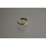 A 9ct gold wedding band (P to Q size) (4.61g)
