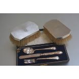 An Edwardian Birmingham silver three piece Christening set comprising a fork, spoon and knife and