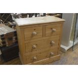 A modern pitch pine chest, the rectangular top with moulded edge above two short and two long