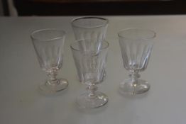 A set of three 19thc crystal thumb cut rummers and a larger similar thumb cut rummer (h.14cm and