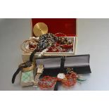 A jewellery box containing miscellaneous costume jewellery including paste pearls, a gentleman's